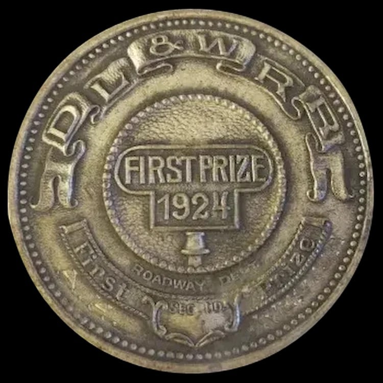 Vintage 1924 Sterling Silver D L & W RR RAIL ROAD First Prize Medal A.H WESTON: Extremely rare 49g sterling silver first prize medal from 1924 awarded to A.H. Weston for the D L & W Railroad. Shipping:Domestic: Flat-rate of $15.00 to anywhere within the contiguous