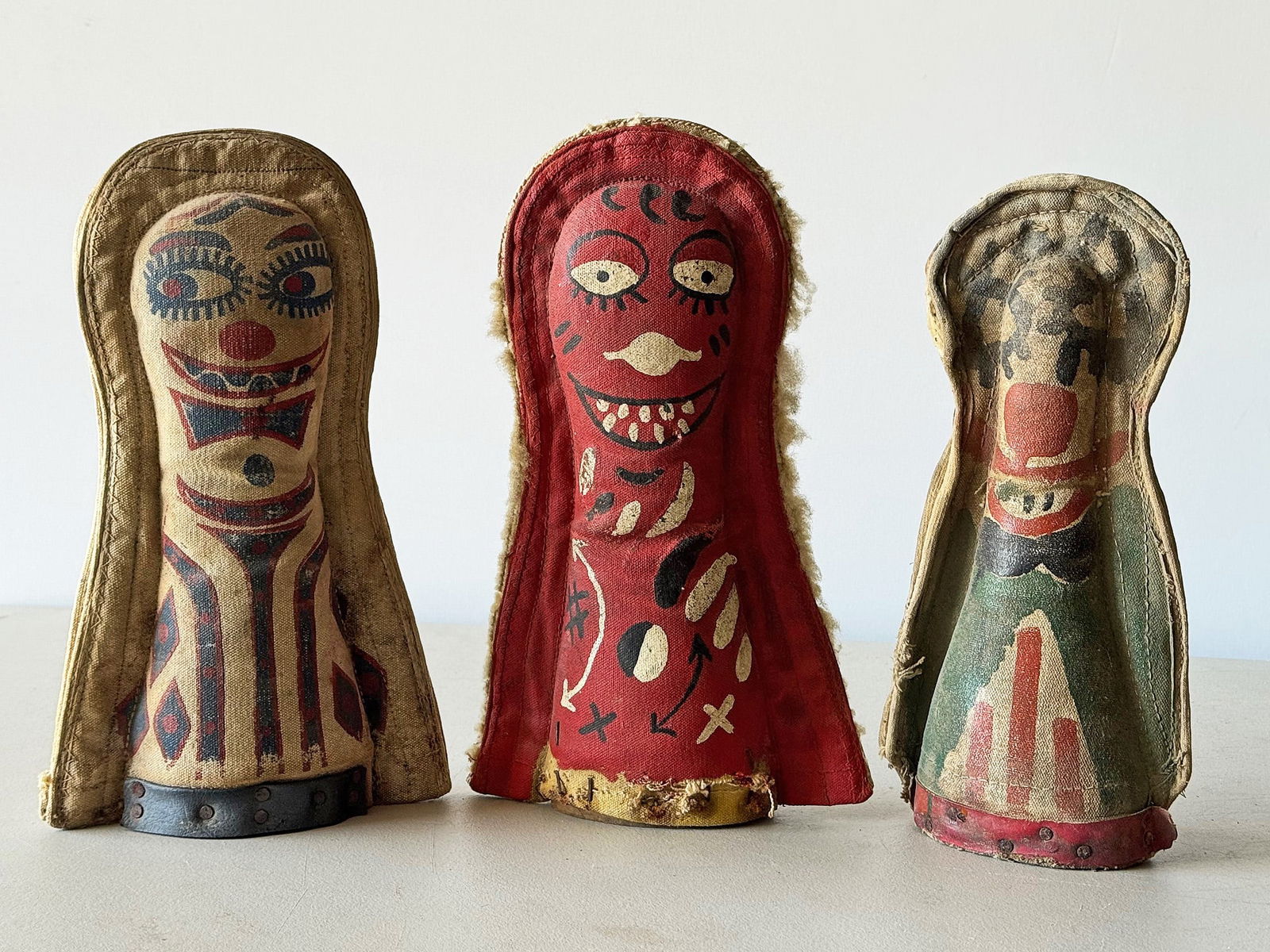 3 Carnival Knockdowns or Punks: Description: Three carnival knockdowns or punks. Adorable painted faces including an Uncle Sam. These were used at carnivals & circuses around the country. One had to knock down the figures to get a