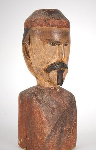 EARLY CARVING BUST OF A MAN: THIS IS A WELL EXECUTED SMALL CARVING. COULD HAVE SAT ON A COUNTER AT A COFFEE & TEA SHOP AS A SALES STIMULATOR. ORIGINAL PAINT. FOUND IN NEW YORK STATE. 6" TALL. DATED TO C. 1860 -80. ALL ORIGINAL 