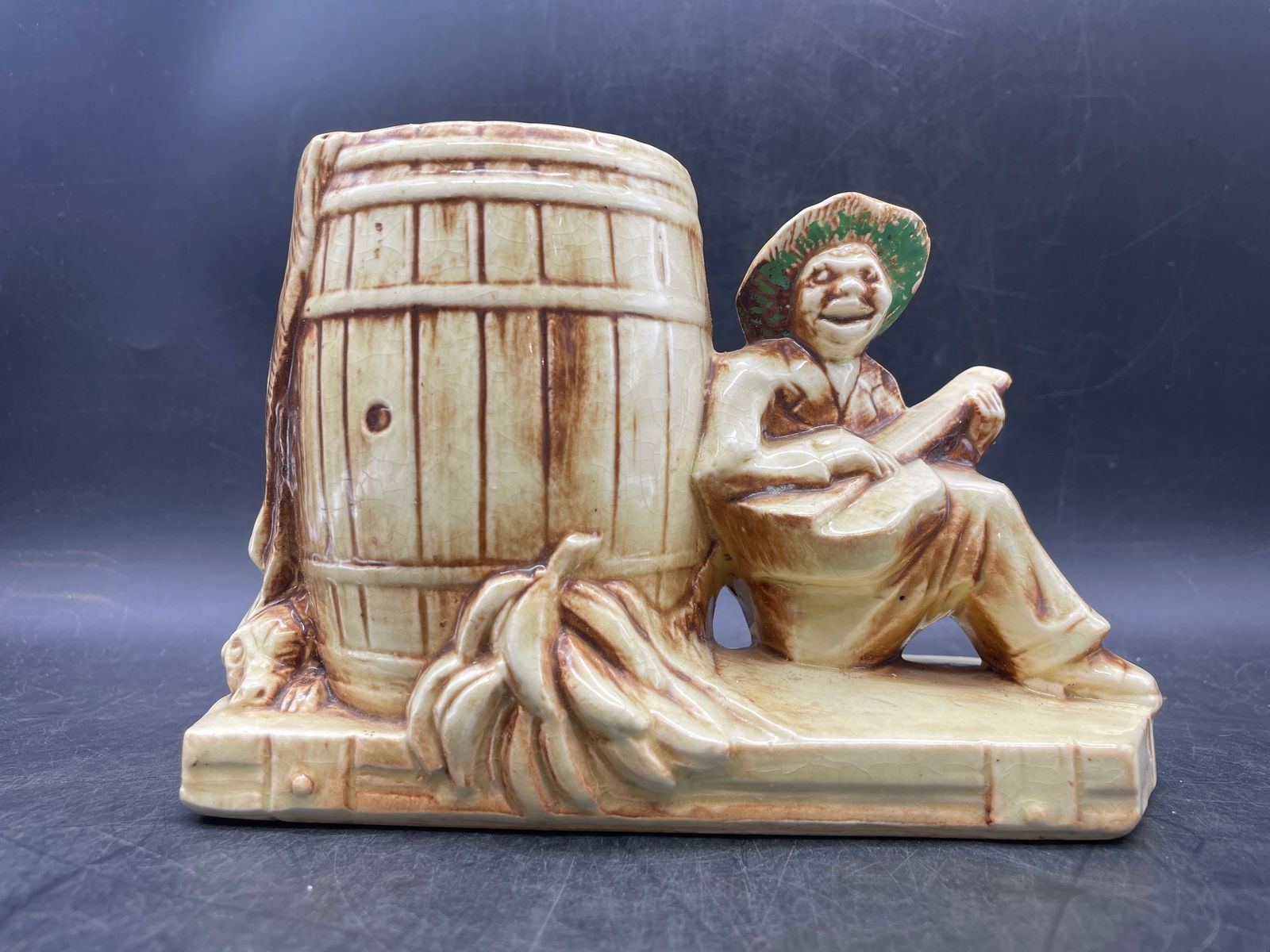 Vintage McCoy Pottery Calypso Line Man & Dog Barrel Ceramic Planter Vase: Date/Period: 1959Dimension: 5" x 7.5" x 3.5"Material: potteryAdditional Information: 1960 Mccoy Calipso Planter Shipping:Domestic: Flat-rate of $15.00 to anywhere within the contiguous