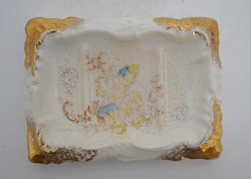 Antique China Floral Design Soap Dish: Title: Antique China Floral Design Soap DishDimension: 3 5/8" wide x 5" long.Date: Circa 1900.Additional Information: Offering for sale an Antique China Soap Dish with floral design. Rectangle in