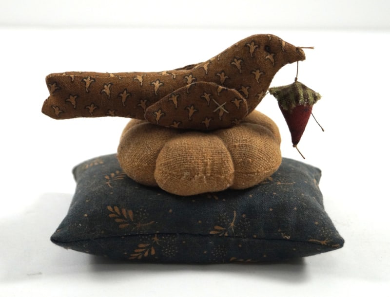 Antique Sewing Distelfink Bird Pin Cushion: Title: Antique Sewing Distelfink Bird Pin CushionDimension: 3 ¼” tall x 4 3/8” long x 3” wideDate: Ca. 1920’s.Additional Information: An exceptional Antique Sewing