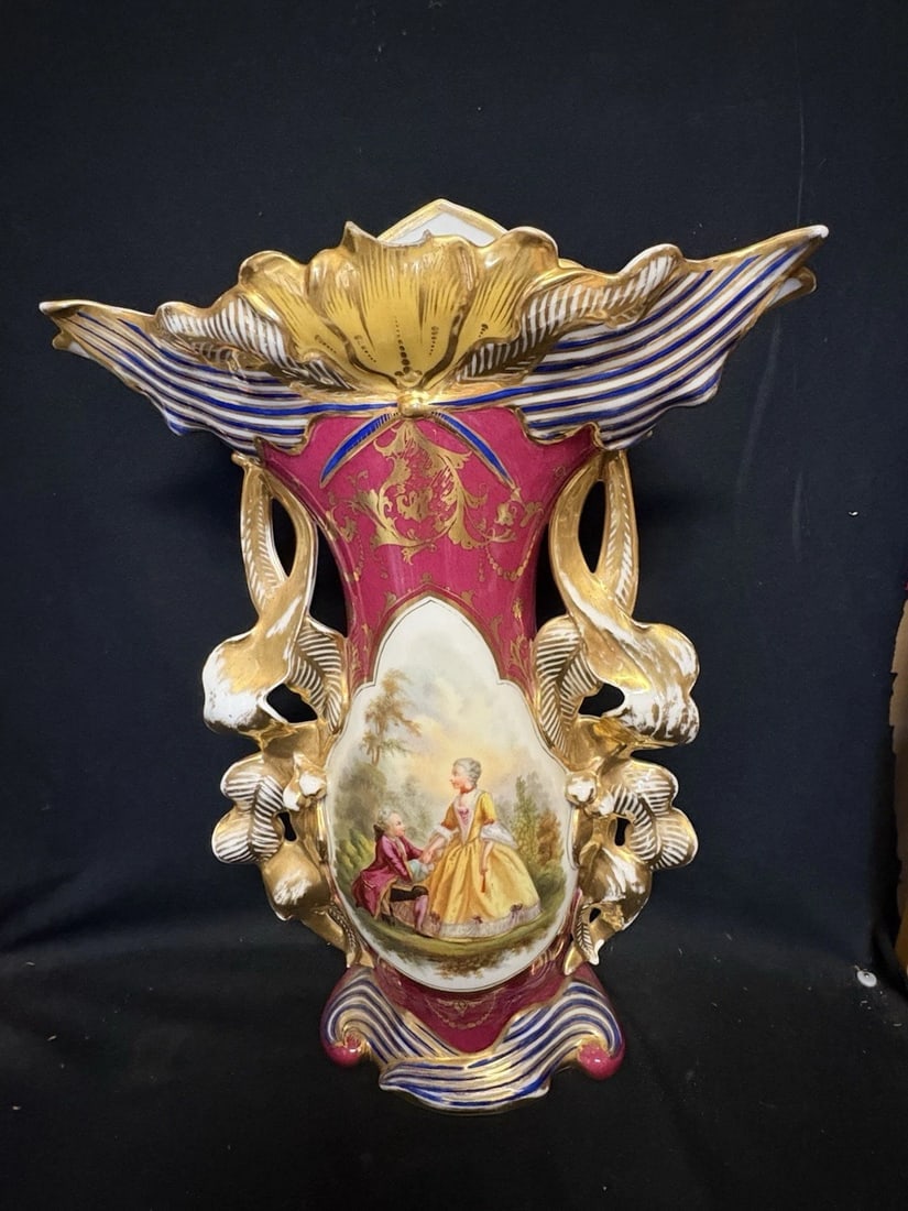 Rare 21” Paris Porcelain Vase: It is 20 1/2” high x 13 3/4” and dates around the 1880’s. It has a tip missing on the top rim. Otherwise it has no other issues. It is an exceptionally large example of a Paris