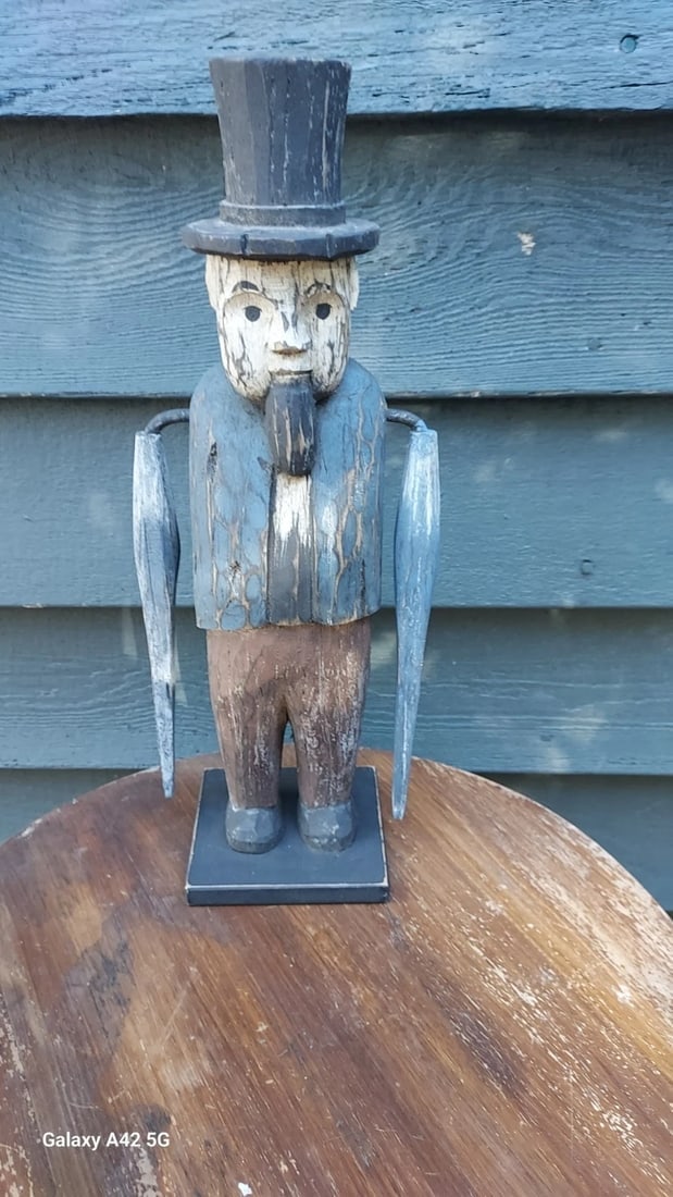 Antique Sailor Whirligig Wooden 1970 14" tall Abe Lincoln hat: Great looking piece in very good condition. Nice design and detail. Arms move but don't rotate. Love the colors. Guessing 1970's. Has a newer base. Main body measures 14". Shipping:Domestic:
