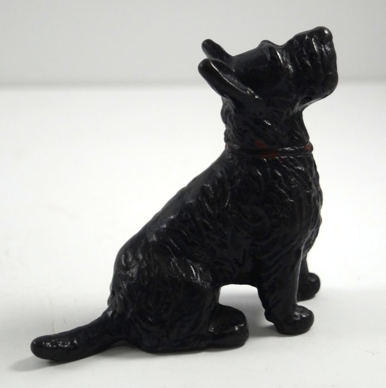 Rare Antique Scottie Dog Cast Iron Paperweight: Title: Rare Antique Scottie Dog Cast Iron PaperweightDimension: 1 3 5/8” tall x 4 1/4” long x app. 1 ½” wideDate: Ca. 1920’s-30’s.Additional Information: