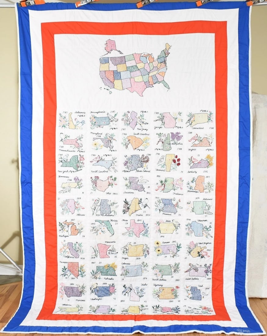 Patriotic USA State Map Quilt: This beautiful cotton blend United States quilt is hand embroidered and hand quilted, with an overall map of the country, with each state underneath, including its date of statehood, state bird, and s