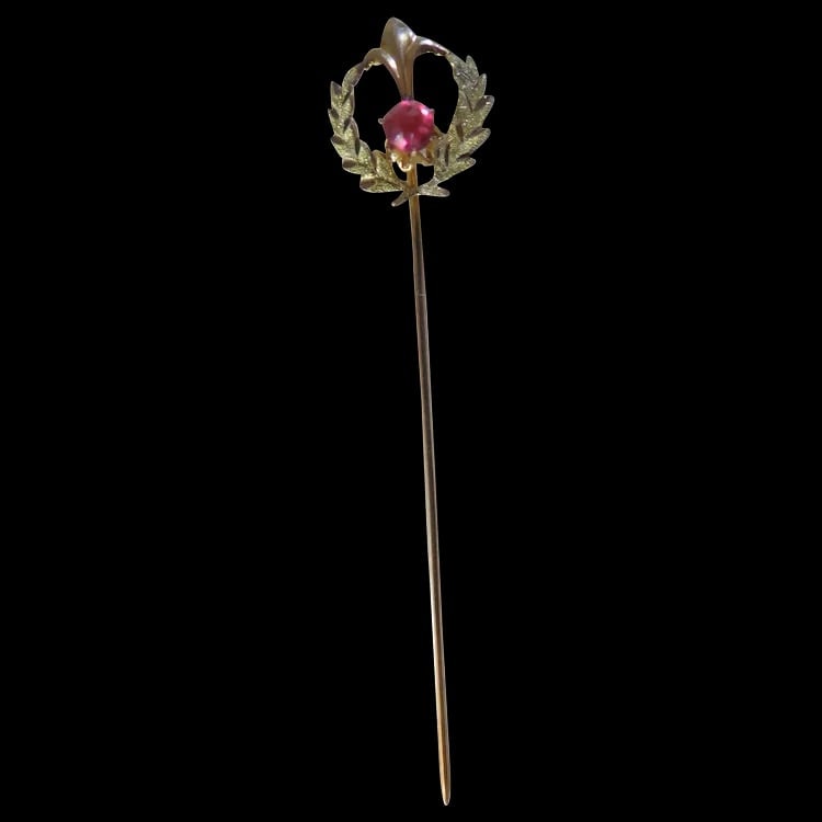 Antique Victorian Wreath Stick Pin 10k Gold: A delicate 10k gold stick pin featuring a Victorian wreath design accented with a glass stone. Shipping:Domestic: Flat-rate of $10.00 to anywhere within the contiguous U.S.International: Foreign