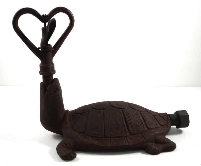 Antique Turtle Cast Iron Lawn Sprinkler: Title: Antique Turtle Cast Iron Lawn SprinklerDimension: App. 8 ¼” tall x app. 10” long x app. 6 ¾” wideDate: Ca. 1920’s-30’s.Additional Information: An