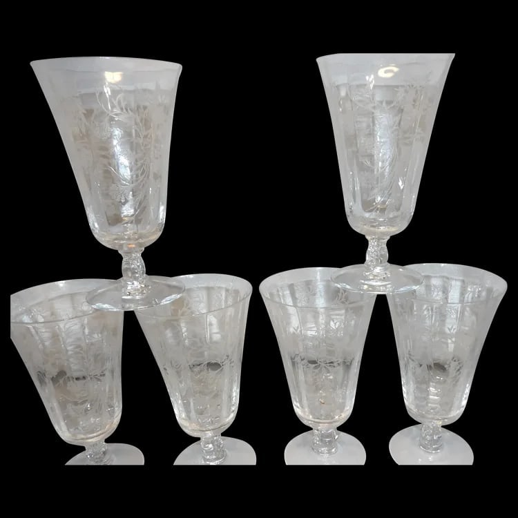 Fostoria Heather Pattern Ice Tea Glasses Set of 6: Set of 6 elegant 12oz iced tea glasses in the Heather pattern (1949–1971). Features detailed floral etching and stands 6 ¼” tall. Shipping:Domestic: Flat-rate of $21.00 to anywhere