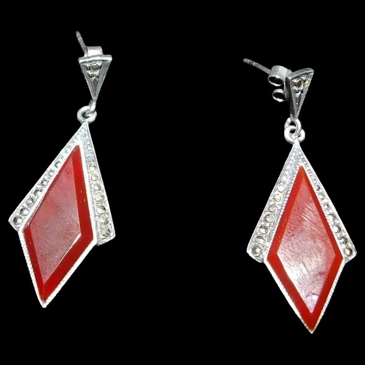 Vintage 925 Silver Earrings Art Deco Style Marcasite: Sterling silver drop earrings in an Art Deco style, set with marcasite and central black stones. Stamped 925. Shipping:Domestic: Flat-rate of $11.00 to anywhere within the contiguous