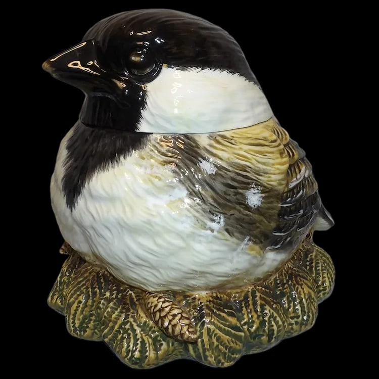 Fat Chickadee Cookie Jar Big Sky Carvers Dean Griff: Whimsical ceramic cookie jar designed by Dean Griff for Big Sky Carvers. Features a round chickadee with a lid. Measures 9” x 7” x 8”. Shipping:Domestic: Flat-rate of $20.00 to
