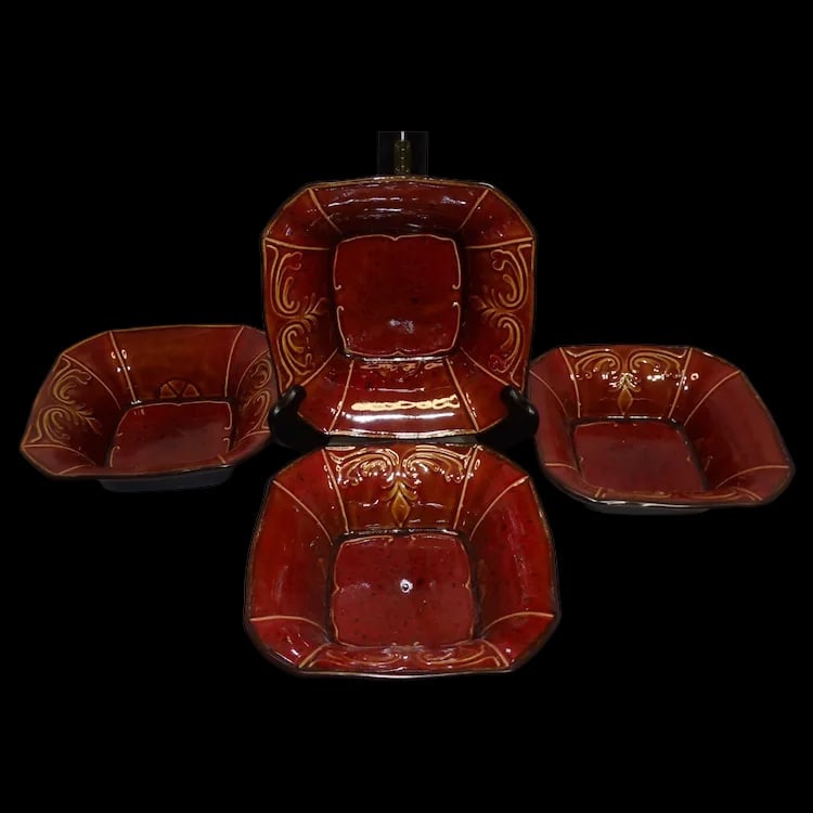 Reba Harmony Victorian Scroll 4 Red Dinner Plates: Set of 4 Reba Harmony Victorian Scroll red dinner plates. Porcelain with embossed scroll interior and matte brown exterior. Near MINT. Item ID: ls009682. Shipping:Domestic: Flat-rate of $26.00 to