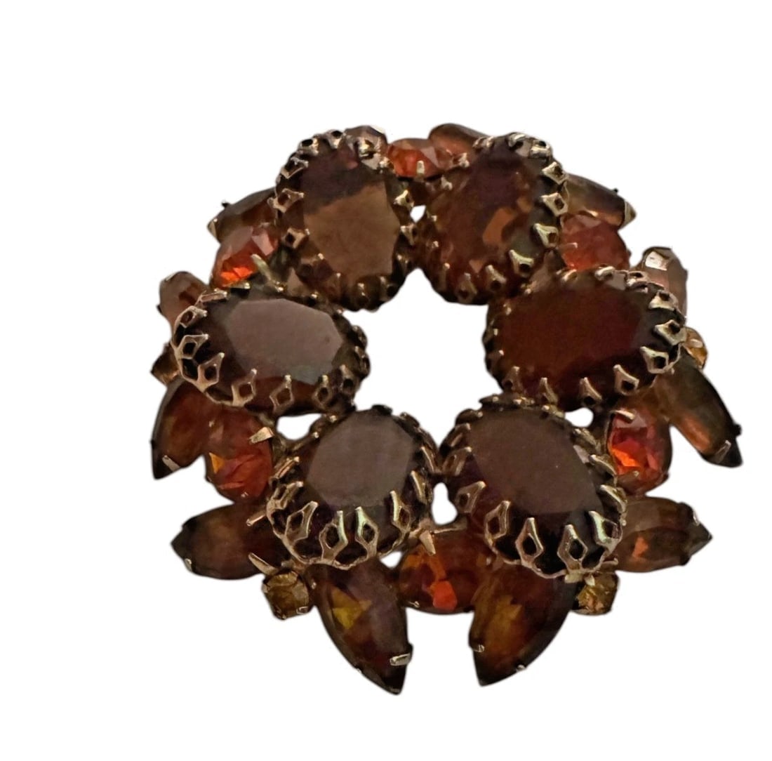 Stunning Citrine Amber Rhinestone Brooch Gold Tone Vintage Weiss Juliana Style: This Citrine Amber Rhinestone Brooch in gold tone vintage Weiss Juliana style is a stunning piece that exudes retro charm. With round and marquise shaped glass stones in shades of gold, brown, and