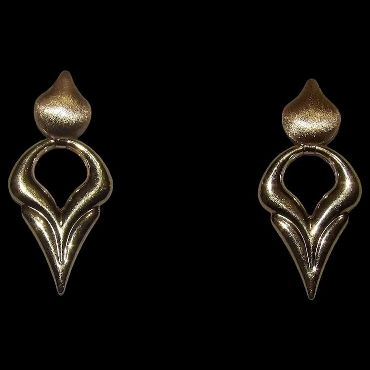 Brev Italian 14 KT Gold Convertible Hearts Earrings: Near MINT condition Italian 14KT yellow gold earrings. Convertible design allows the heart dangles to be worn down (1.5 long) or folded up (13/16 long). Hallmarked 'Brev ITALY (14k)'. Weight 3.8g. 