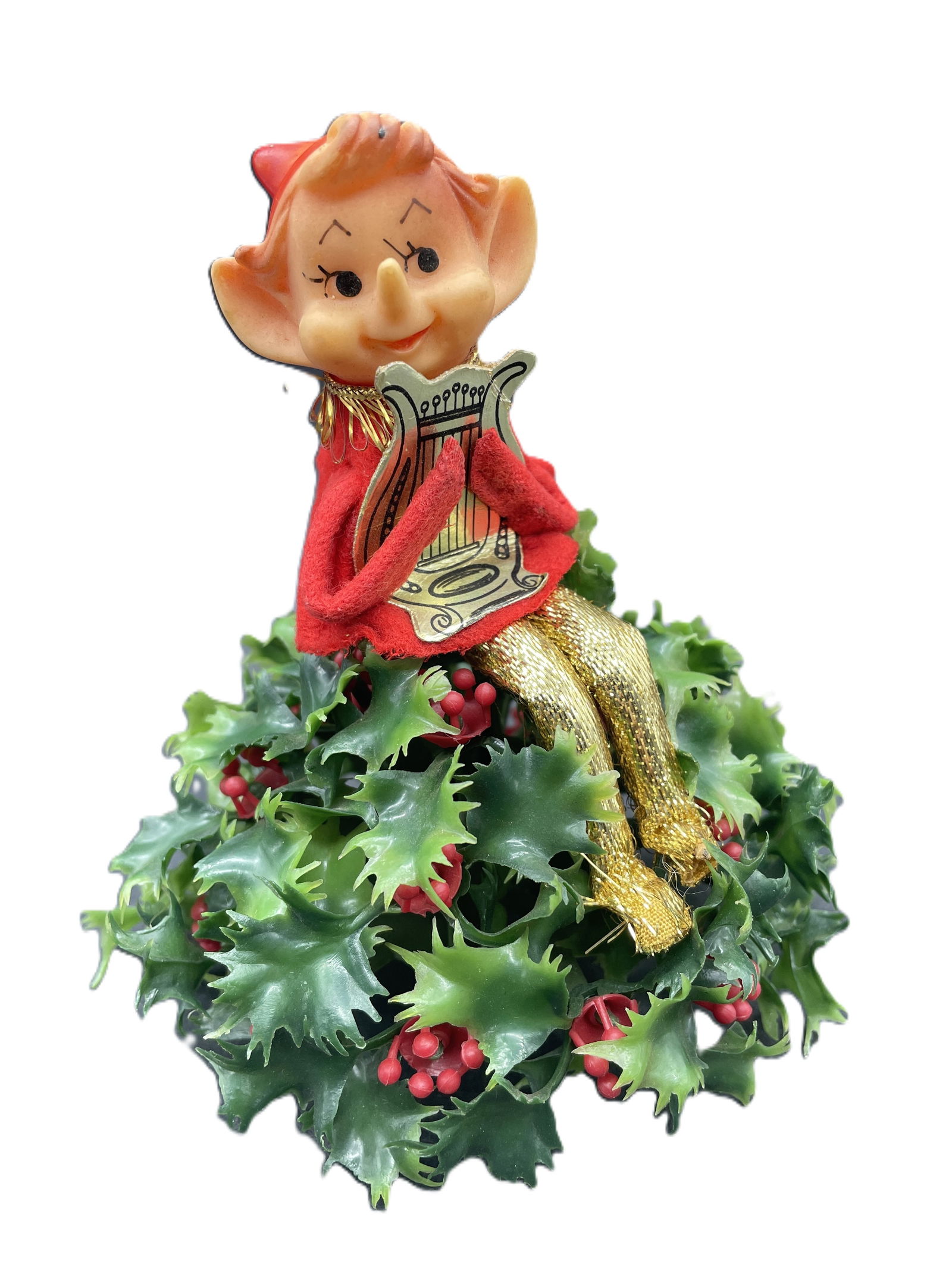 Vintage Knee Hugger Elf Holly Christmas Décor: Date/Period: Approx 1950'sDimension: 5" tall x 4" diameterMaterial: plasticAdditional Information: Vintage Knee Hugger Elf Holly Christmas Décor Shipping:Domestic: Flat-rate of $7.00 to