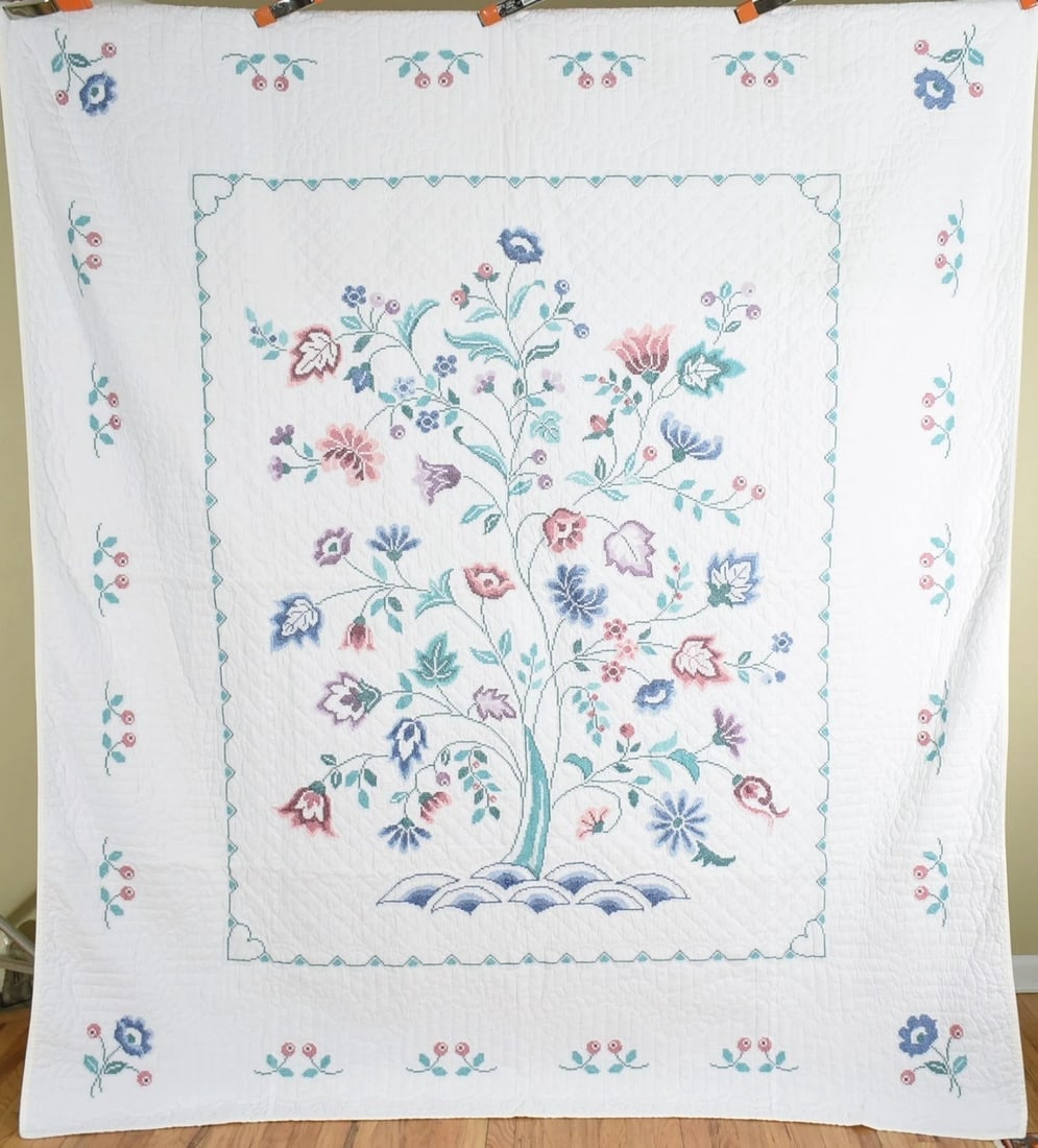 Vintage Tree of Life Quilt: This wonderful cotton 50's tree of life quilt is hand cross stitched and hand quilted, with a floral border. It measures 84" X 98" and is in excellent condition, with a couple of small, inconspicuous