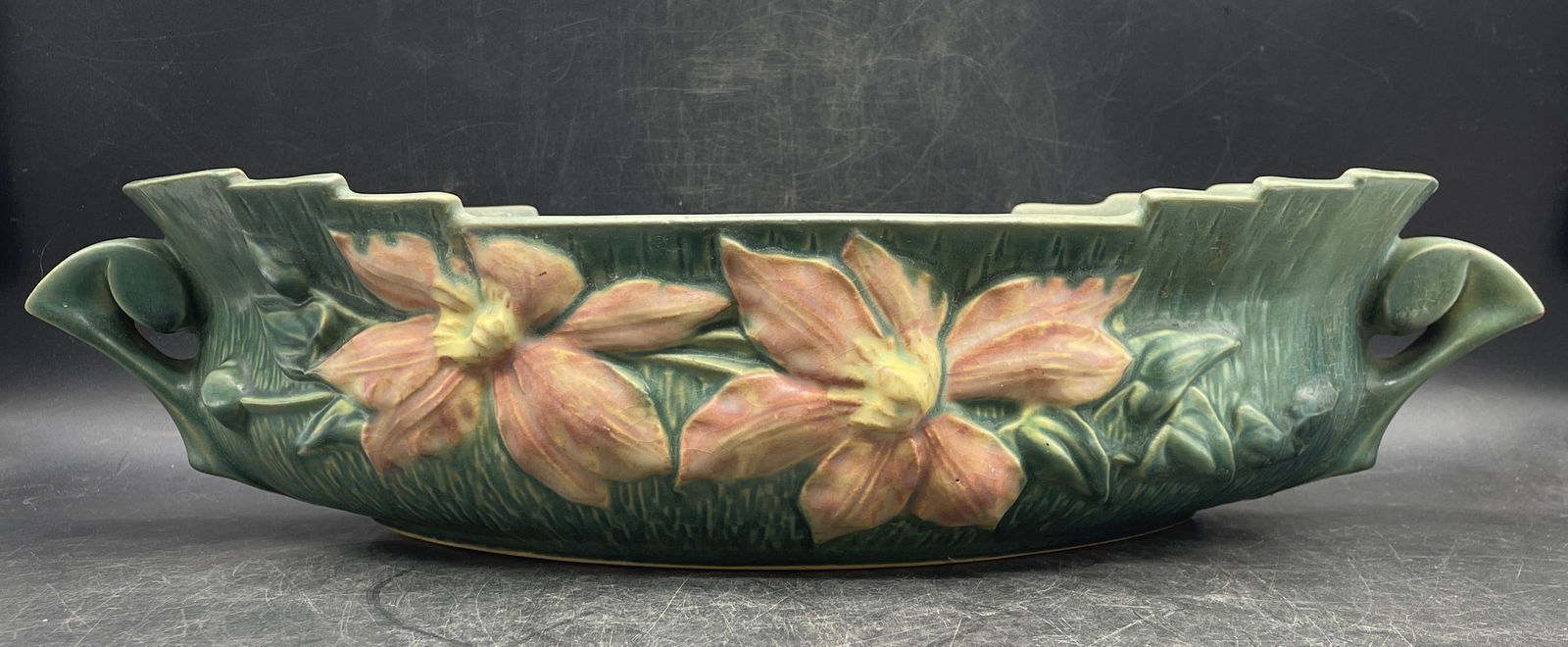 ROSEVILLE USA POTTERY CLEMATIS CONSOLE BOWL Green 461-14": Date/Period: unknownDimension: measures 17.5" wide handle to handle and 8" from front to back and 4" tall at the endsMaterial: POTTERYAdditional Information: Elevate your home decor with the timeless