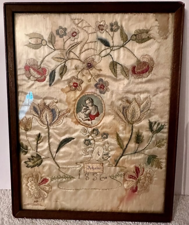 Small Needlework on Silk Dated 1836: This small needlework (possibly crewel work) on silk is dated 1836 and appears to be a memorial to a child, Johanes. There is a small round image in the center of a young boy hugging a sheep. Just bel
