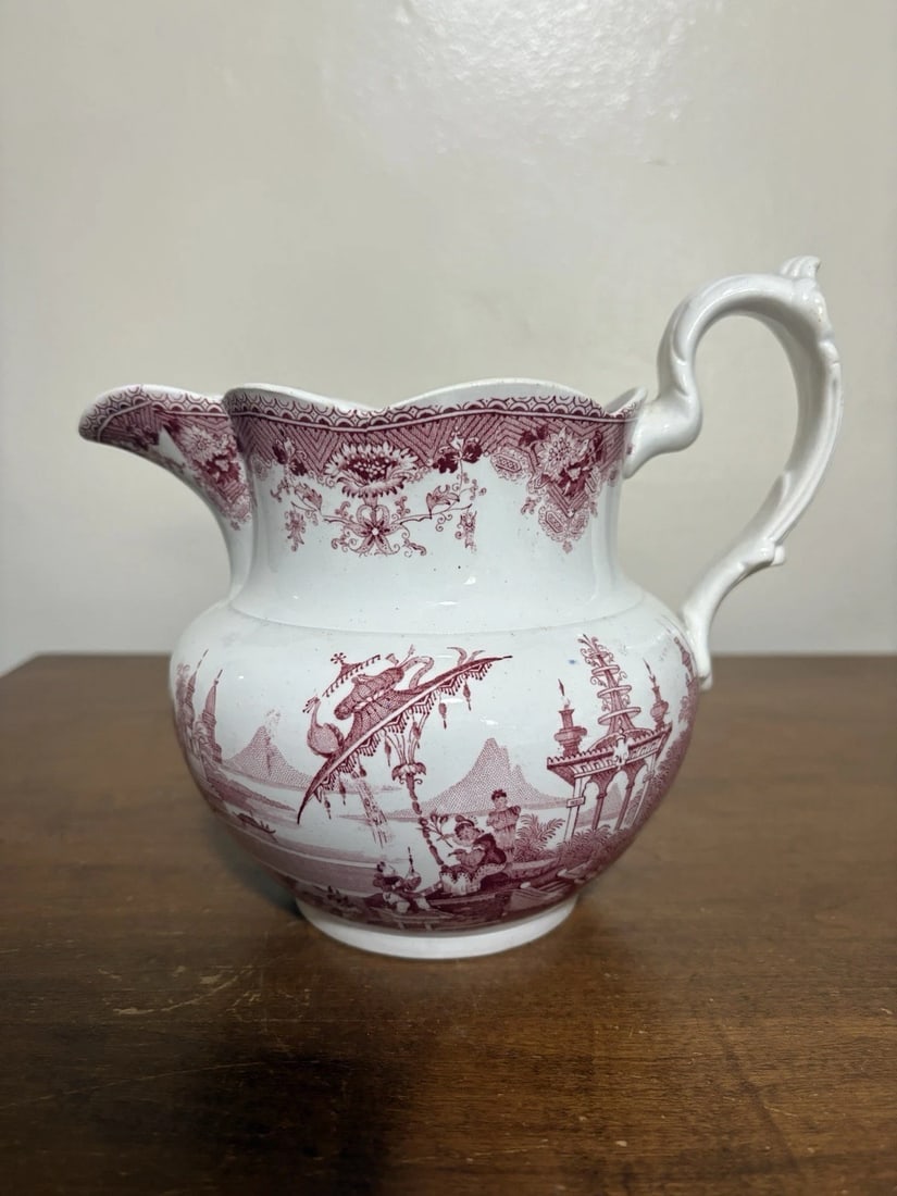 Red Staffordshire Pitcher: It is 6 3/4” high and dates around the 1830’s. It has no chips, cracks or repairs Shipping:Domestic: Flat-rate of $15.00 to anywhere within the contiguous U.S.International: Foreign
