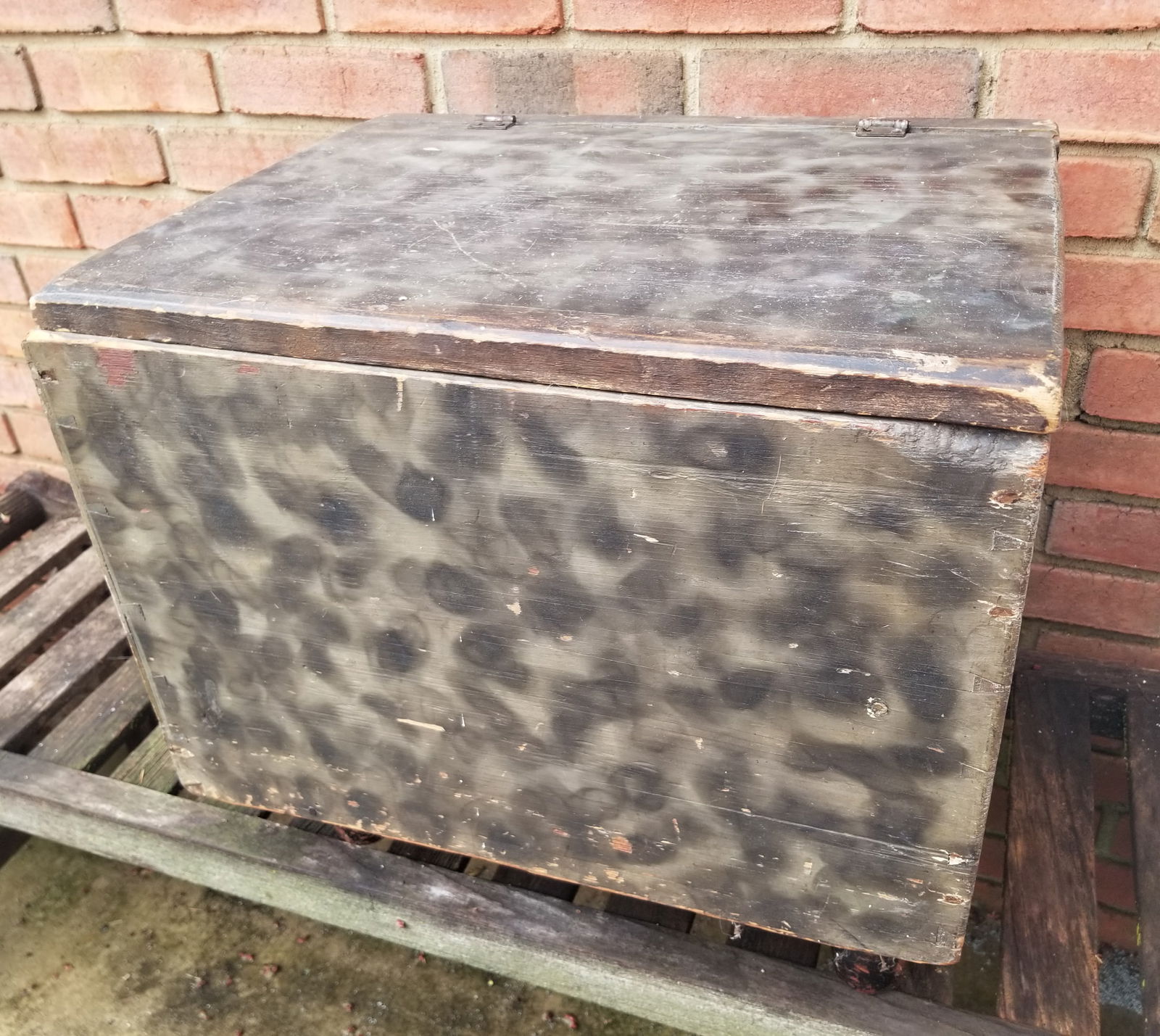 Unusual smoke-decorated painted box with spool-type feet: Gray and black. Square nails and dovetailed. Some paint wear as shown. PA c. 1860s. Initialed. 19 1/2 by 16. Shipping: Domestic: Shipping rates are determined by destinat
