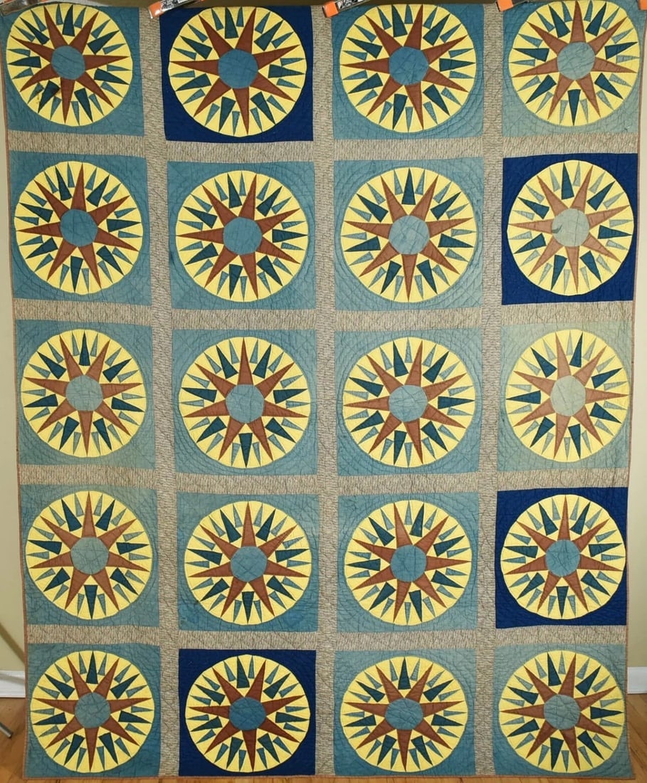 1870's Mariner Compass Quilt: This DAZZLING cotton 1860's/1870's 28-point mariner's compass quilt is all hand pieced and hand quilted, with an unusual color combination. The quilt came out of Kentucky. It measures 76" X 96" and is