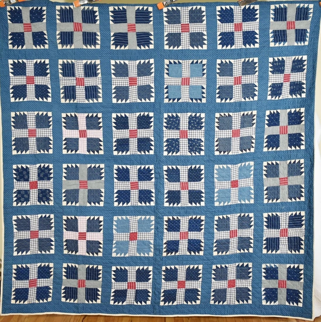 1890's Red, White & Blue Bear Paw Quilt: This BEAUTIFUL cotton 1890's bear paw quilt is all treadle machine pieced and hand quilted, with maroon print centers and a variety of cadet blue and indigo prints. It measures 80" X 80" and is in exc