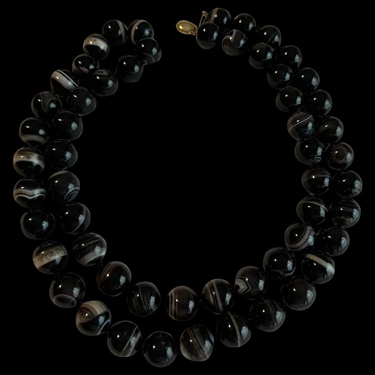 Amazing Vintage Agate Beaded Necklace 34: A long 34-inch strand of smooth banded agate beads featuring a 14k yellow gold clasp. Shipping:Domestic: Flat-rate of $15.00 to anywhere within the contiguous U.S.International: Foreign shipping