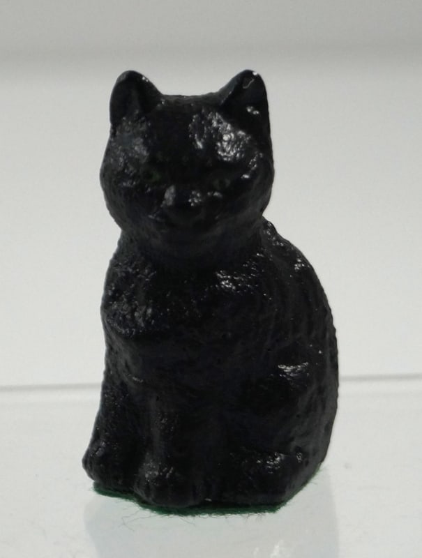 Antique Sitting Kitten Cat Cast Iron Paperweight #5: Title: Antique Sitting Kitten Cat Cast Iron Paperweight #5Dimension: 1 3/4” tall x 7/8” wideDate: Ca. 1950’s.Additional Information: Full-figure, solid casting cast iron sitting