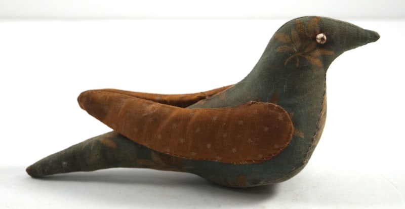 Antique Sewing Distelfink Bird Pin Cushion: Title: Antique Sewing Distelfink Bird Pin CushionDimension: 3 ¼” tall x 7” long x 1 7/8” wideDate: Ca. 1920’sAdditional Information: An exceptional Antique Sewing