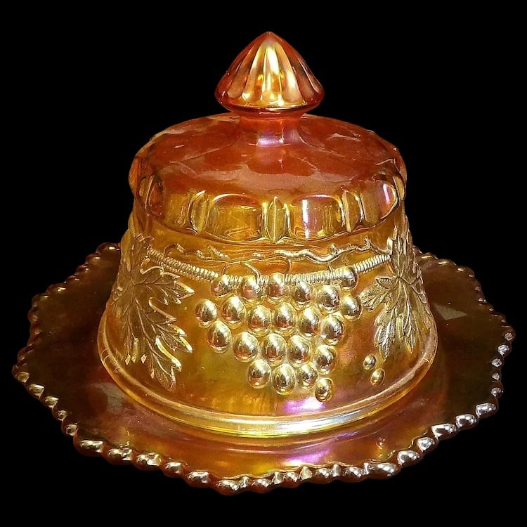 Antique Northwood Grape and Cable Butter Dish: Excellent condition antique carnival glass butter dish by Northwood. Deep amethyst color with high iridescence. No chips, stains, or flea bites. Measures 7.5 wide and 6 tall. Stamped with the Northwoo