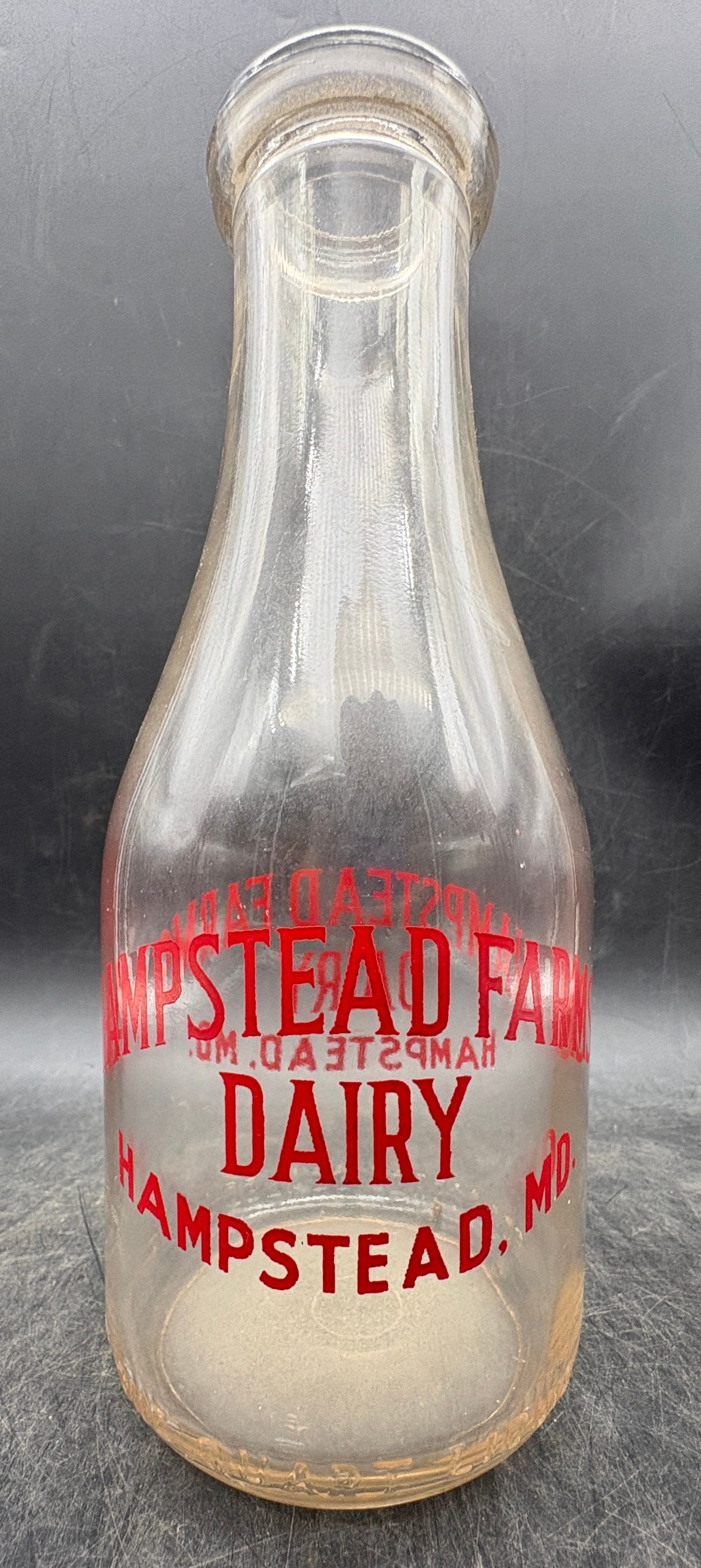 Vintage Hampstead Farms Dairy One Pint Milk Bottle - Hampstead Maryland: Date/Period: unknownDimension: One Quart 3.5" diameter x 9.5" tallMaterial: glassAdditional Information: Vintage Hampstead Farms Dairy One Pint Milk Bottle - Hampstead Maryland Shipping:Domestic: