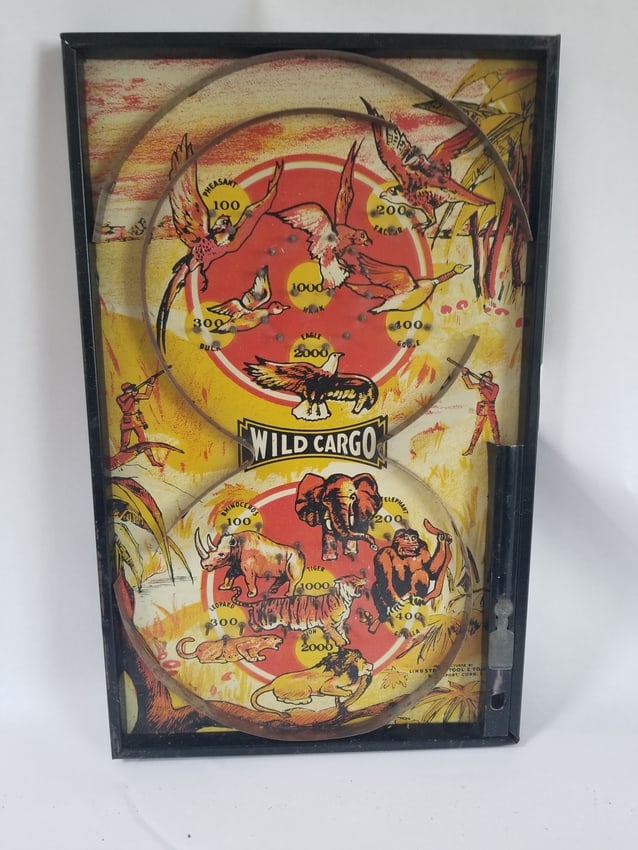 Pinball game Wild Cargo, the back is a baseball game: Signed Lindstrom Tool and Toy Co, Bridgeport CT. Post WW ll. Highly sought after maker. 15 inches long. Shipping:Domestic: Shipping rates are determined by destinationInternational: Foreign