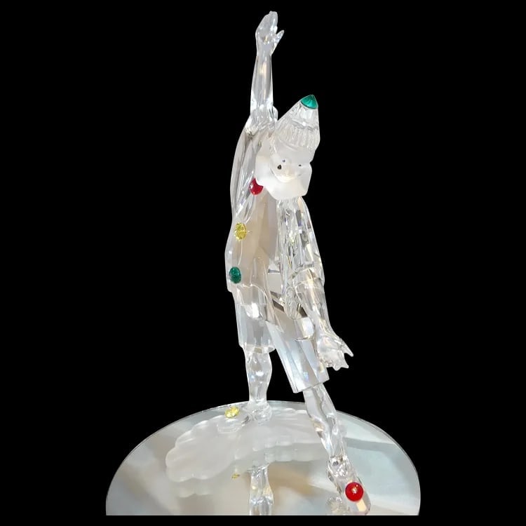 Swarovski Crystal 1999 Annual SCS Masquerade Pierrot Figurine: The 1999 annual SCS edition 'Pierrot' figurine. Comes with original box, stand, and title plaque. Measures 8” tall. Shipping:Domestic: Flat-rate of $20.00 to anywhere within the contiguous