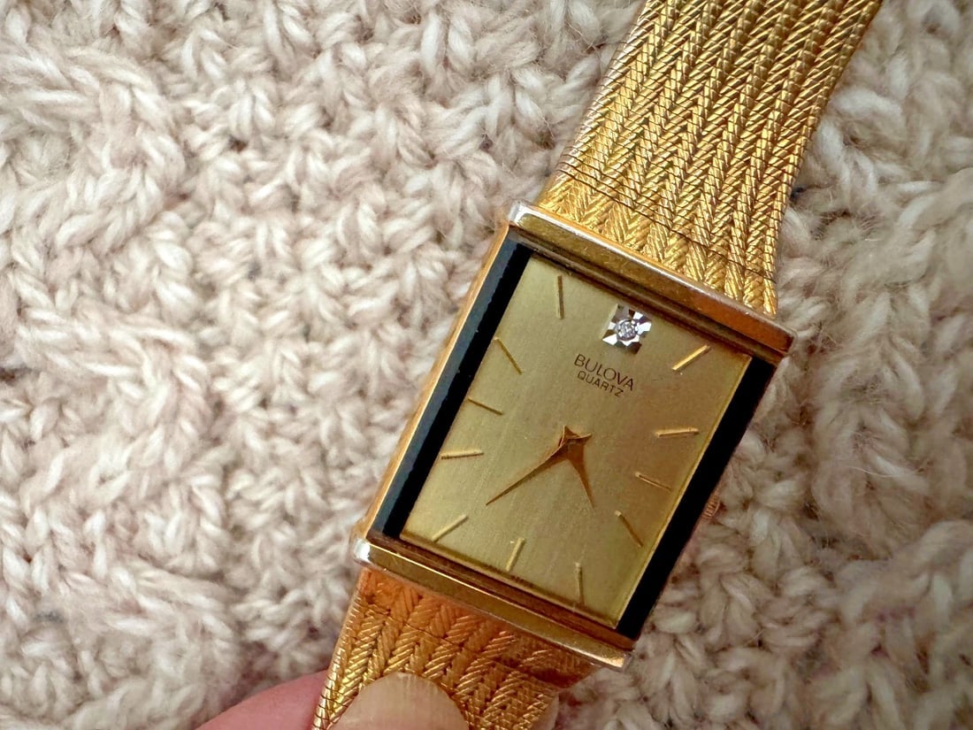 Vintage bulova watches mens working 25 year gift: The product is a vintage Bulova men's quartz wristwatch, suitable for a 25th anniversary gift. This analog display timepiece features the Bulova brand name and is known for its quality craftsmanship.