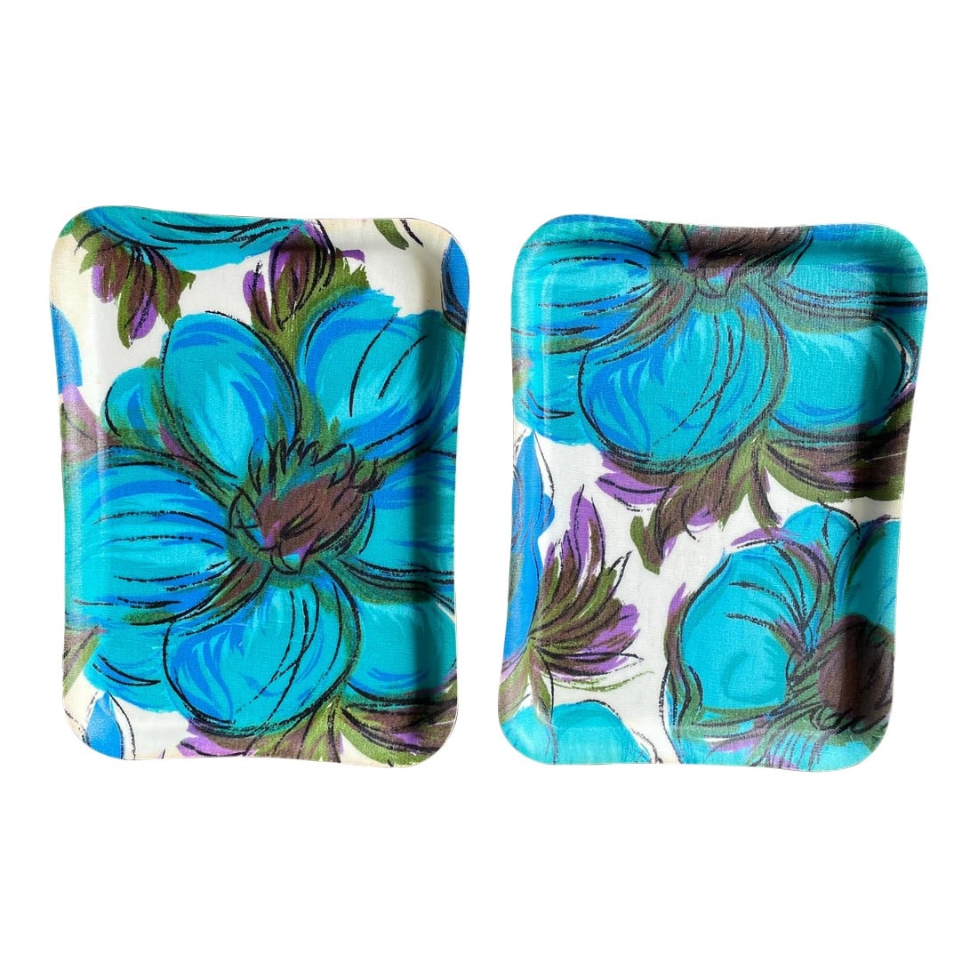 Mid Century Floral Resin and Fiberglass Drink Trays- a Pai: Resin and fiberglass drink trays circa the 1960s. Both are free from cracks and chips. One shows some yellowing, the other is in very good shape. Can be used for more than just drinks. Can be used in