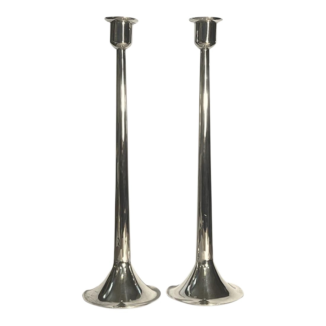 Pair of 1940s Antonio Pineda Sterling Silver Candlesticks: One pair of Sterling Silver stamped, Antonio Pineda candlesticks. Stamped with Antonio, Taxco Crown Hallmark. 31oz of Mexican Sterling Silver. 15 1/2 x 4 1/2 with the top diameter being 2"
