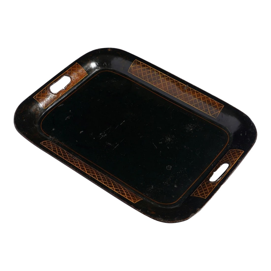 English Tole Tray With Diapered Panels on the Rolled Rim, C. 1840: Rectangular tole tea tray with rolled rim painted with diapered reserves and pierced on the narrow ends with handle grips. England, circa 1840. Condition: Alterations: Original Condition Unaltered