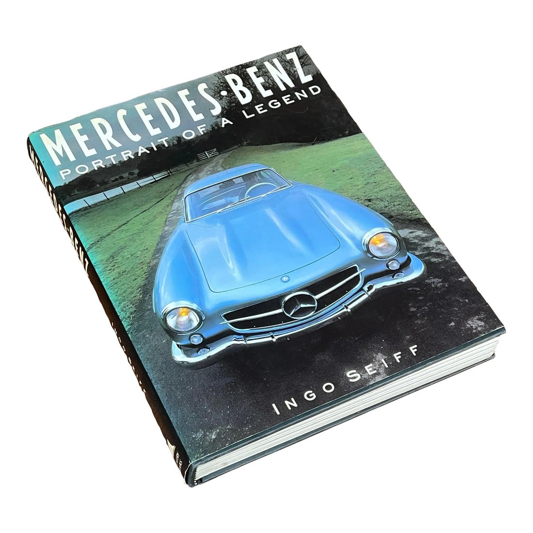 Vintage Mercedes Benz Portrait of a Legend Coffee Table Book: Fabulous vintage coffee table book of Mercedes Benz' cars! Excellent illustrations and content! It measures 10 3/4" wide by 13 1/2" tall and 1 1/2" thick. Very good vintage condition as shown, age