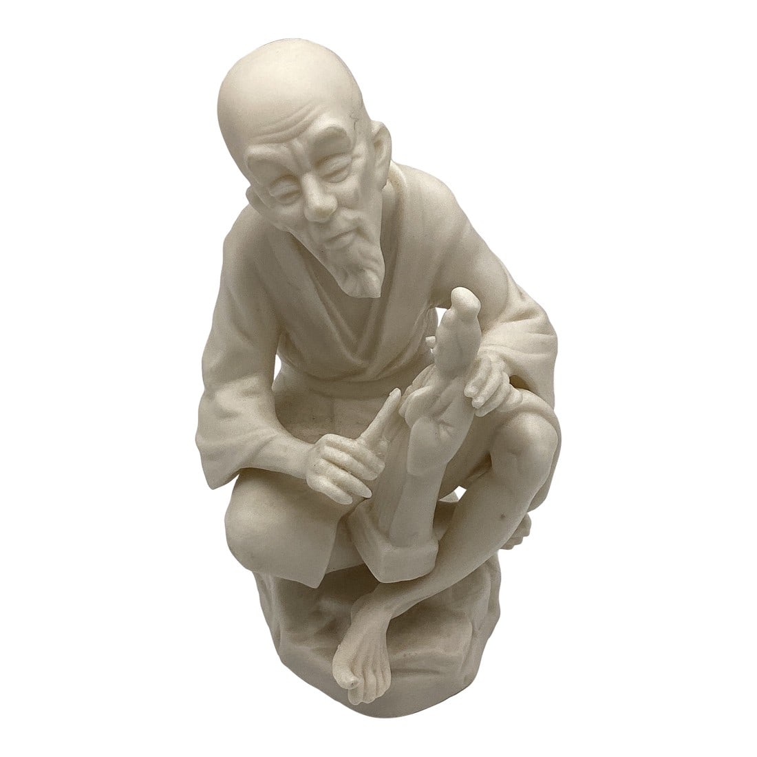 1950s China Ardalt Porcelain Asian Man Lenwile Japanese Parian Style Figurine: Vintage Lenwile China Ardalt porcelain figurine depicting an Asian Man sitting cross-legged and meticulously carving a doll or small figure This figurine has a delicate, detailed carving style, typica