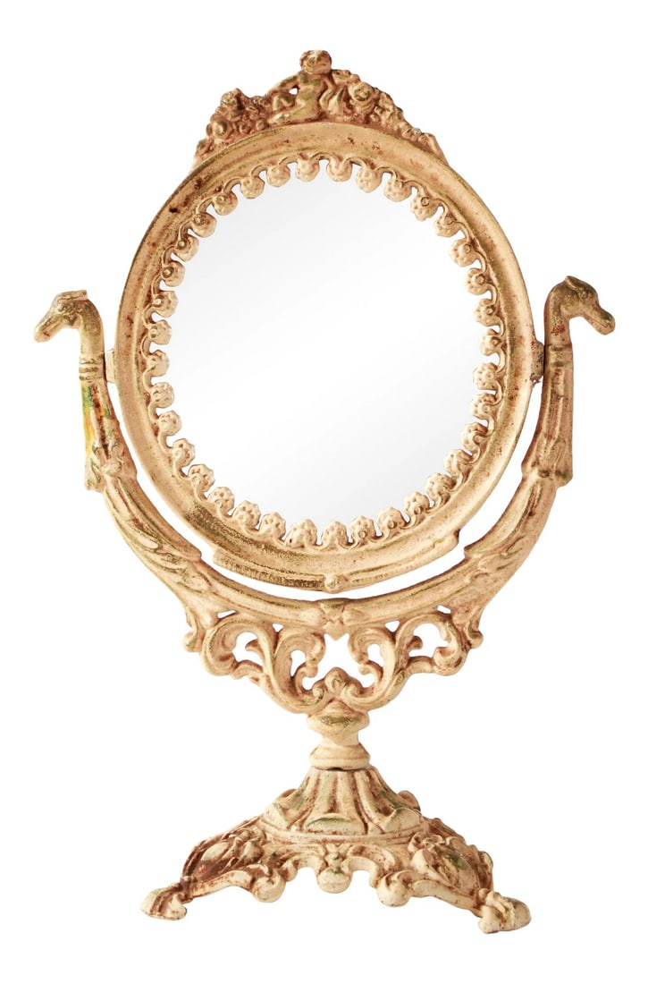 Antique White Iron Swivel Vanity / Dresser Mirror: Stunning vintage cast iron vanity / make-up mirror in an old antique white paint, with beautiful details like the dragon heads and cast floral bouquets! It's in very good overall condition as you