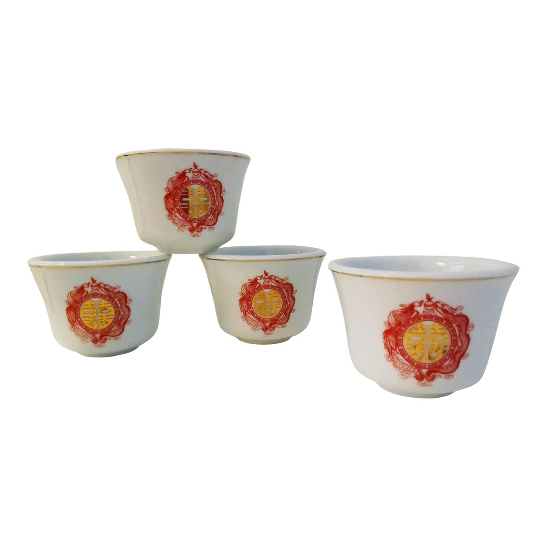 Mid-Century Gold Embossed Red Dragon Sake/Tea Cups, Set of 4: Mid-Century set of four Cathay China white porcelain sake/tea cups featuring a red dragon motif on both sides with gold Chinese sign in center and gold rims. Marked underside "Cathay China."