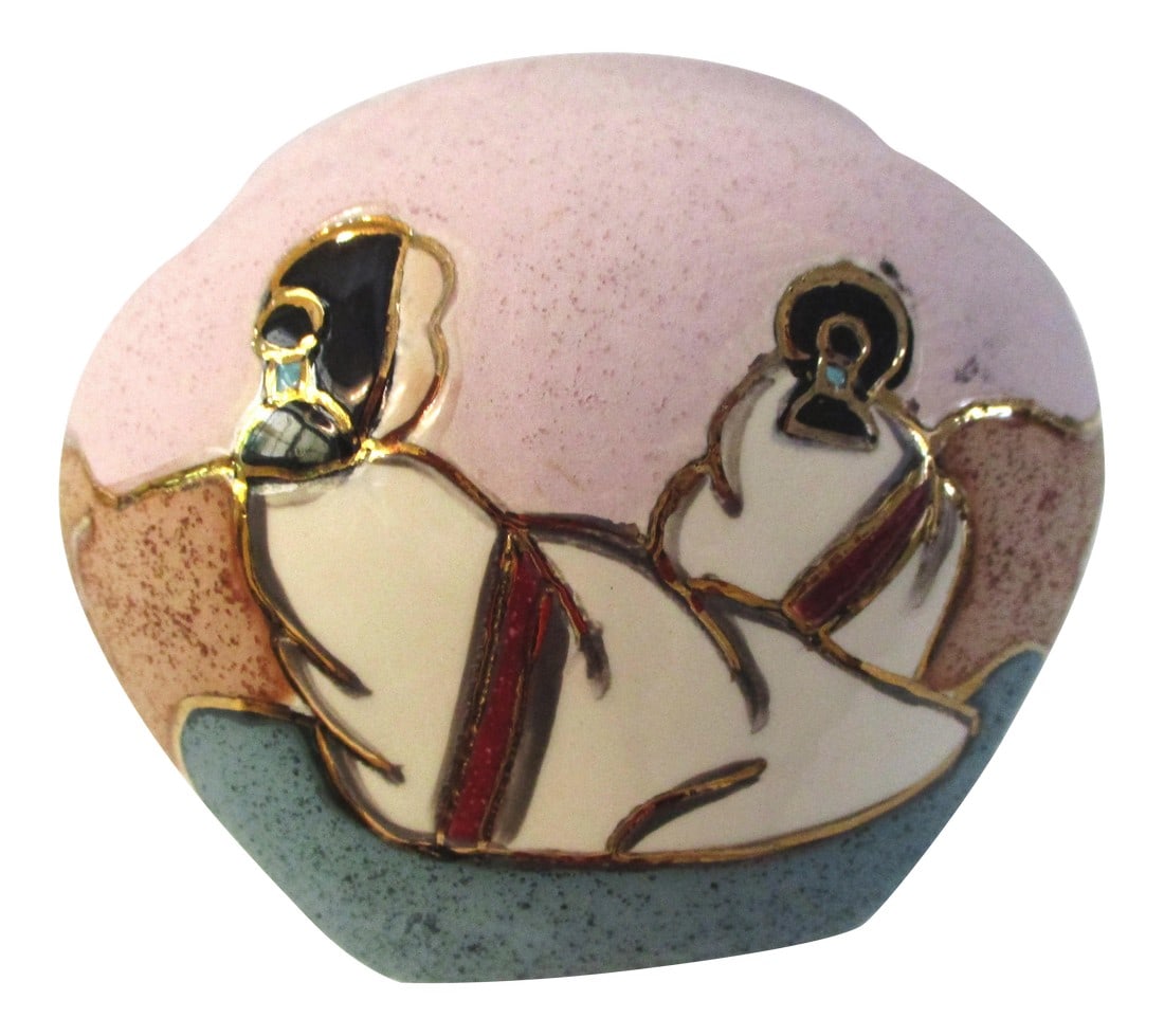 1980s Southwestern Navajo Women Bowl: Vintage Southwestern ceramic bowl in shades of light beige, tan and aqua with glazed gold accents. Face of bowl features two Navajo women in traditional dress in a glazed finish. Condition: