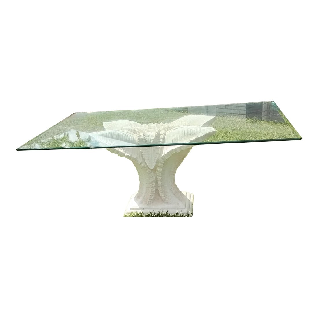 1960s Old Florida Beach Dining Table: Nothing speaks Palm Beach like a banana leaf base glass top table. The white resin could be painted or left as is. Can sit 6 easily 8 somewhat comfortably. It's thick and chunky, not easy top