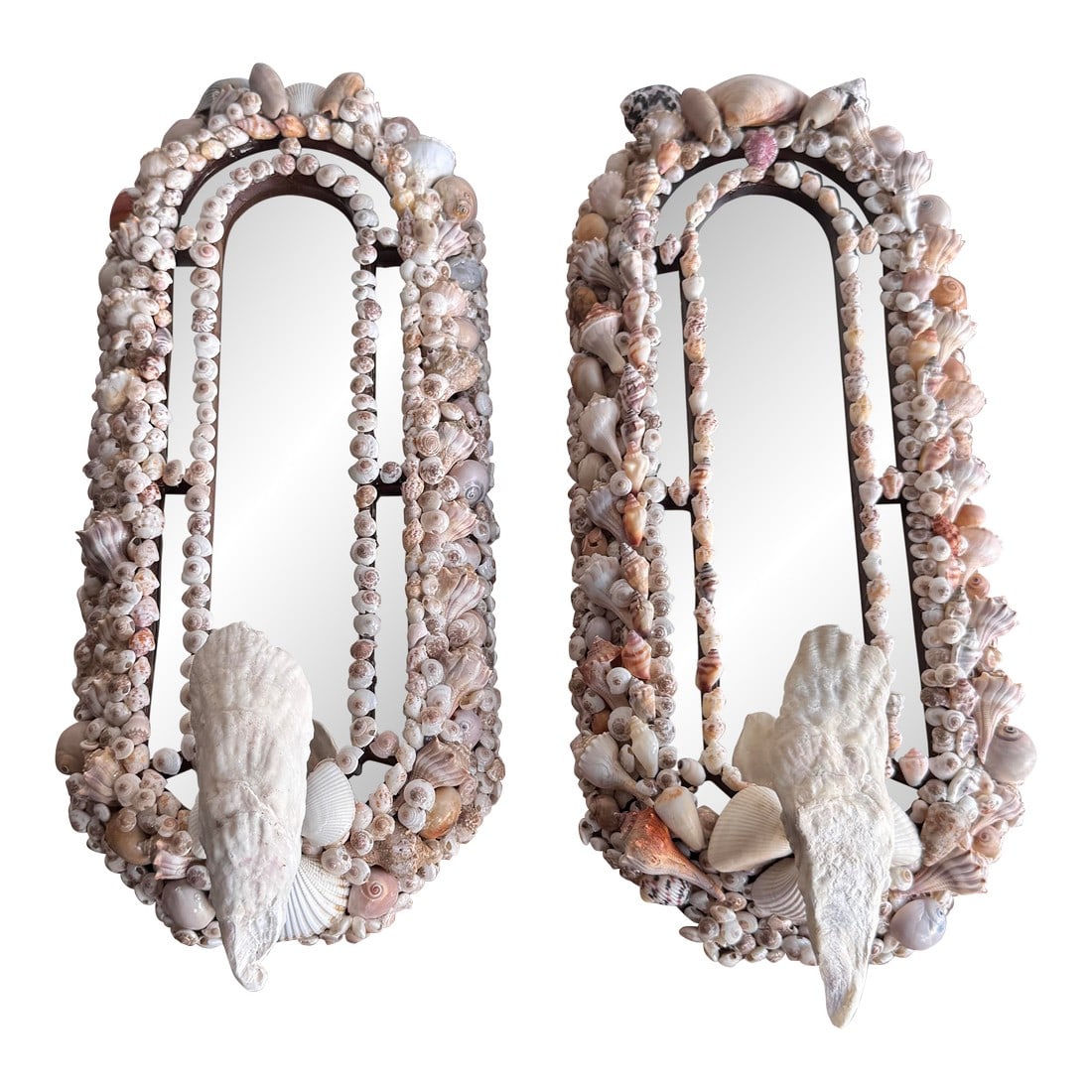 Handcrafted Mirrored and Shell Encrusted Wall Sconces- A Pair: A pair of seashell encrusted sconces that hold candlesticks and is mirror backed. The pair could function solely as mirrors, if you'd like. The candlestick holder is concealed with the oyster shell. 
