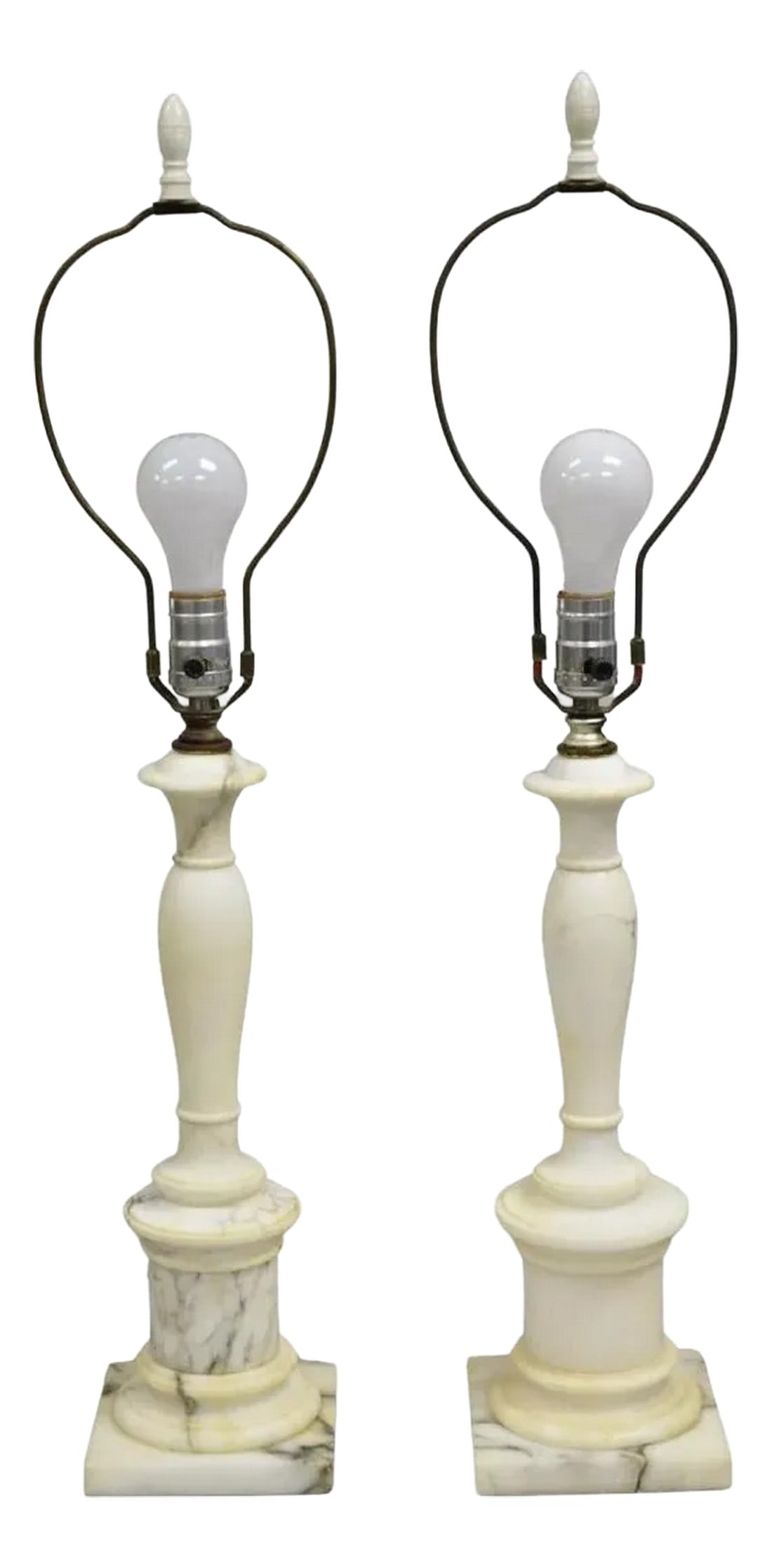 Vintage Italian Classical Carved White Marble Column Table Lamps - A Pair: Vintage Italian Classical Carved White Marble Column Form Table Lamps - a Pair. Circa Mid 20th Century. Measurements: 29.5" H (to finial) x 19.5" H (to light socket) x 5.5" W x 5.5" D. Standard antiqu