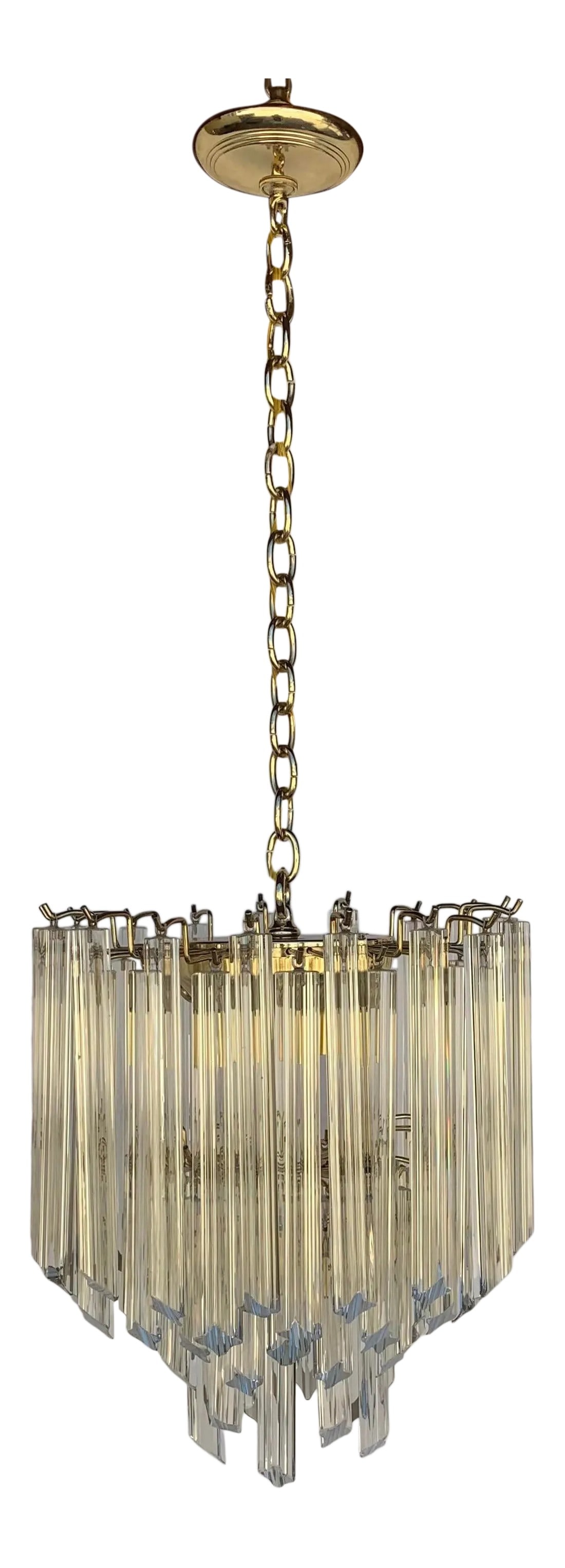 1970's Venini Chandelier: 1970's Murano glass Venini prisms Chandelier, brass polished Frame 10 candelabra stylelight bulbs and 1 regular light bulb that is goes along the bottom, 16" Diameter x 17" H without the chain overall