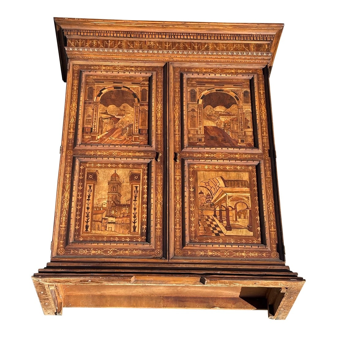 Engraved Italian Art Antique Intricate Armoire With Landscape Scenes Depicted: This Italian Antique Intricate Armoire is a true statement piece"”rich in history, master craftsmanship, and artistry. Its beautifully carved panels depict detailed narrative scenes, giving the