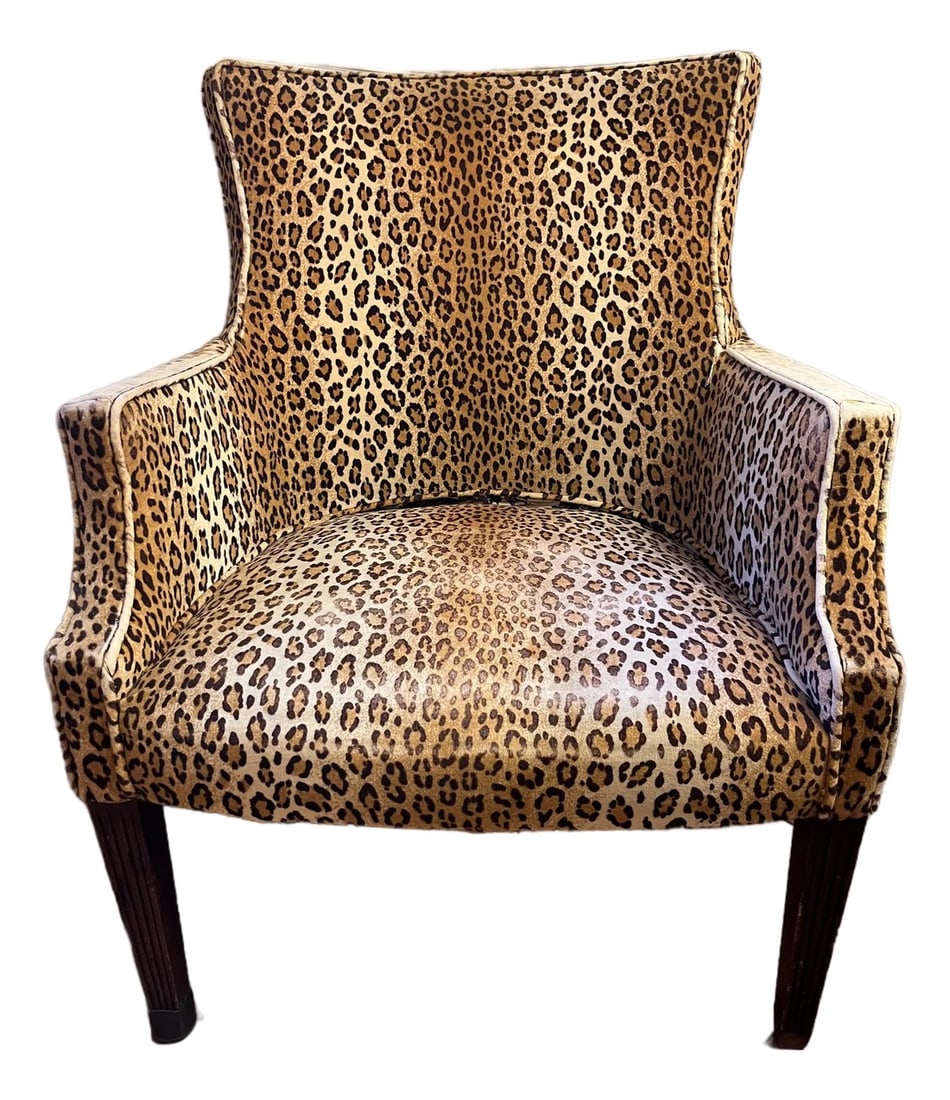 Vintage Leopard Print Armchair: Vintage armchair with leopard print fabric, purchased at a New York City designer show house about 15 years ago Condition: Alterations: Original Design Modified Imperfections: Some Imperfections