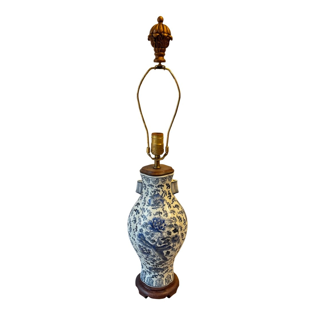 Early 19th Century Chinoiserie Blue and White Table Lamp From Hong Kong: Its hand-painted floral and landscape motifs bring sophistication and artistry to any room, while the rich cobalt blue contrasts gracefully against the crisp white ceramic body. Ideal for
