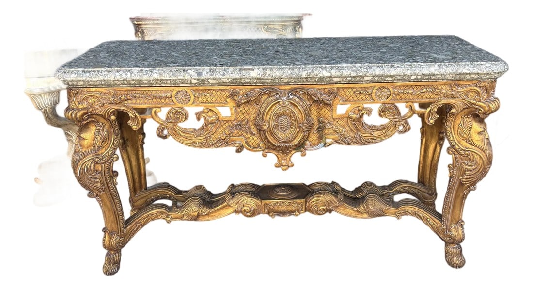Late 19th Century Louis XIV-style Gilded Wood and Grey Marble Top With King's Faces Carved Console: Bring opulent French grandeur into your home with this Louis XIV–style gilded wood console table, crowned with a luxurious grey marble top. Perfect for an entryway, living room, or formal dining